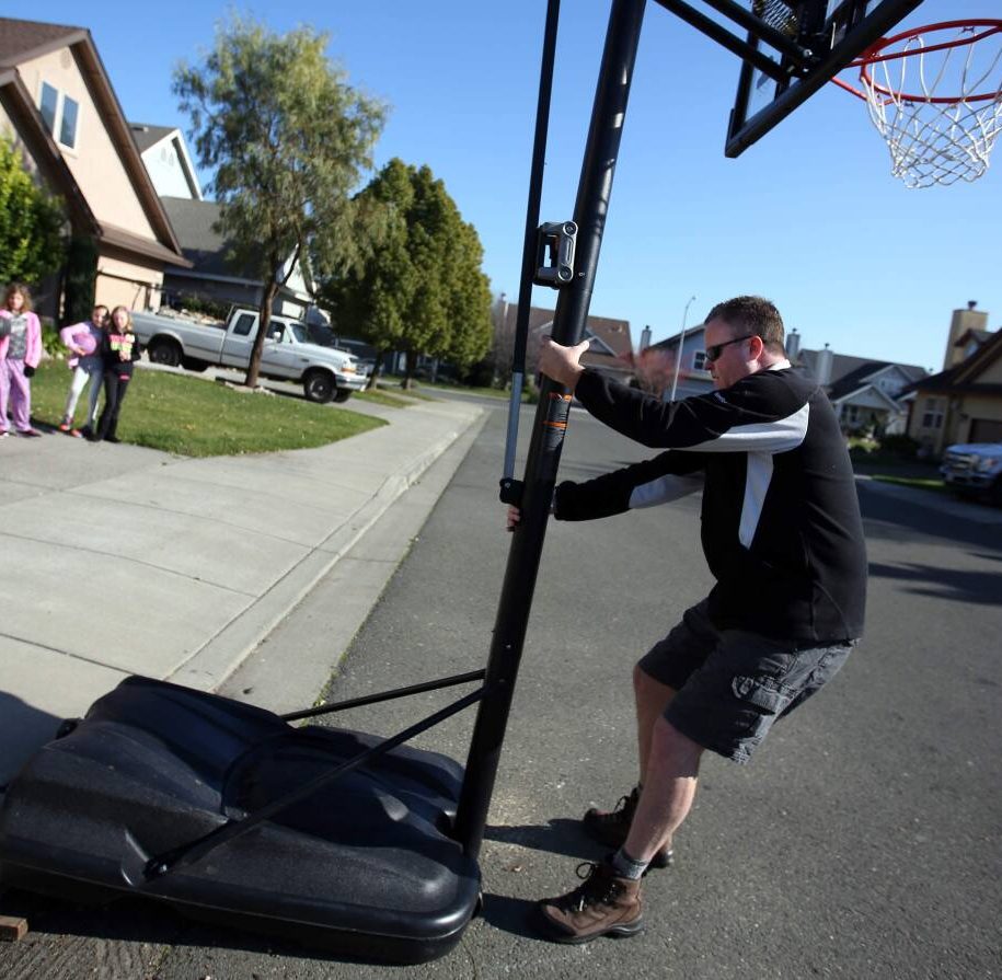 How to Move a Basketball Hoop Filled with Water