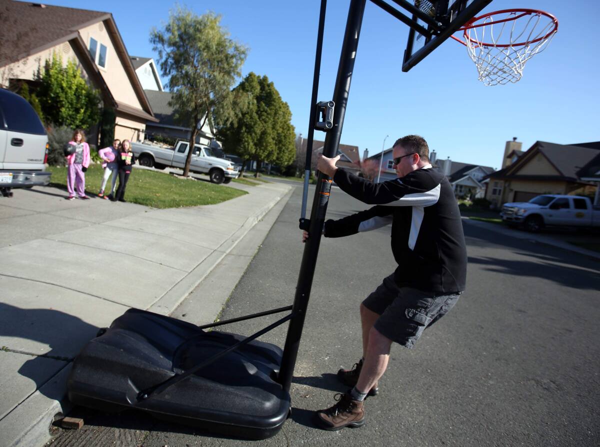 How to Move a Basketball Hoop Filled with Water